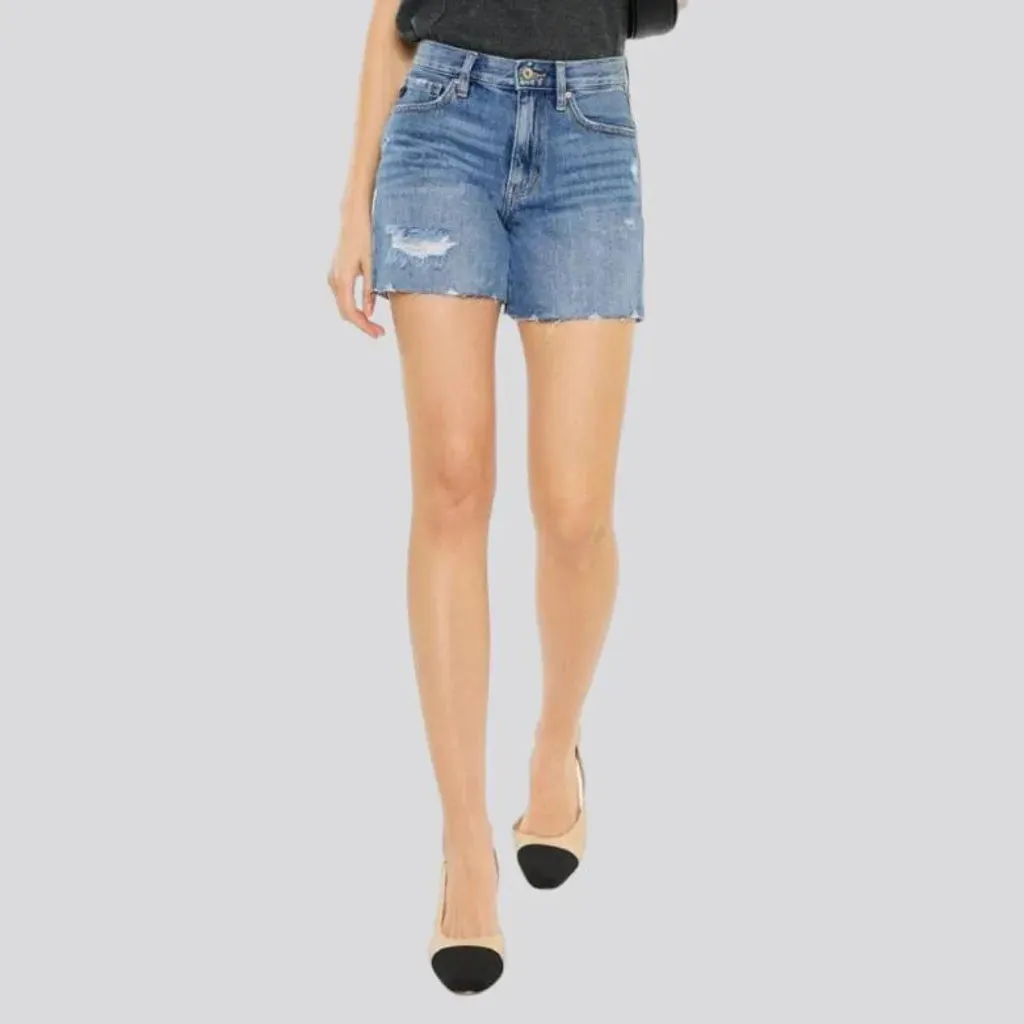 Medium-wash whiskered jeans shorts for women